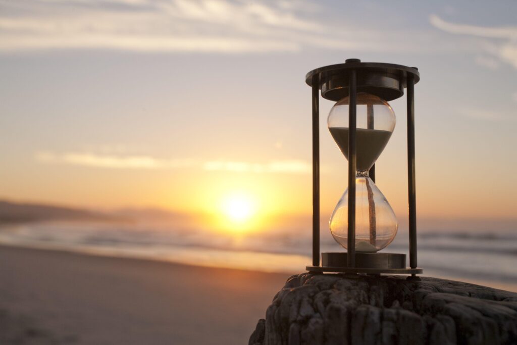 sand clock sunset